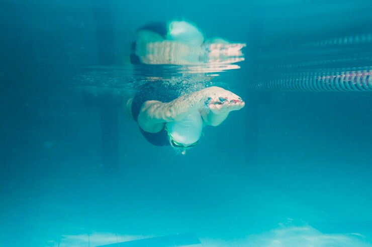 Swimmer competing at MomentumSport Spring Gala