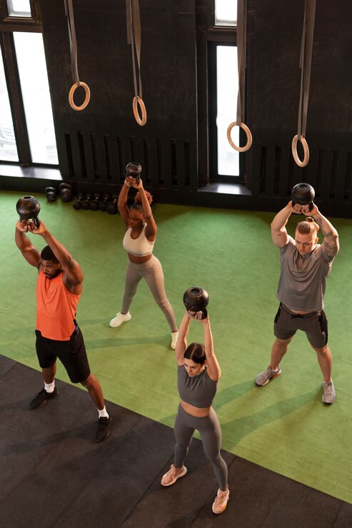 Team competing in the strength challenge at MomentumSport Winter event