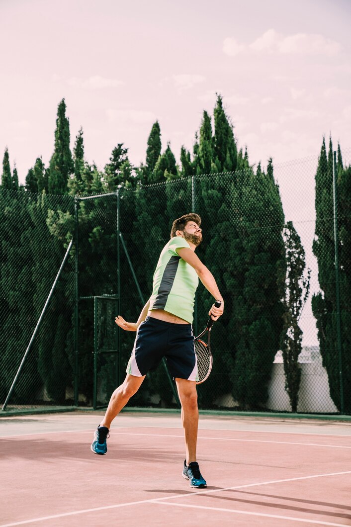 Tennis serve motion on outdoor court